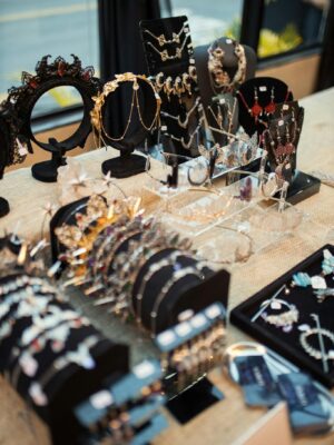 Chic display of various jewelry pieces in a boutique storefront setting.